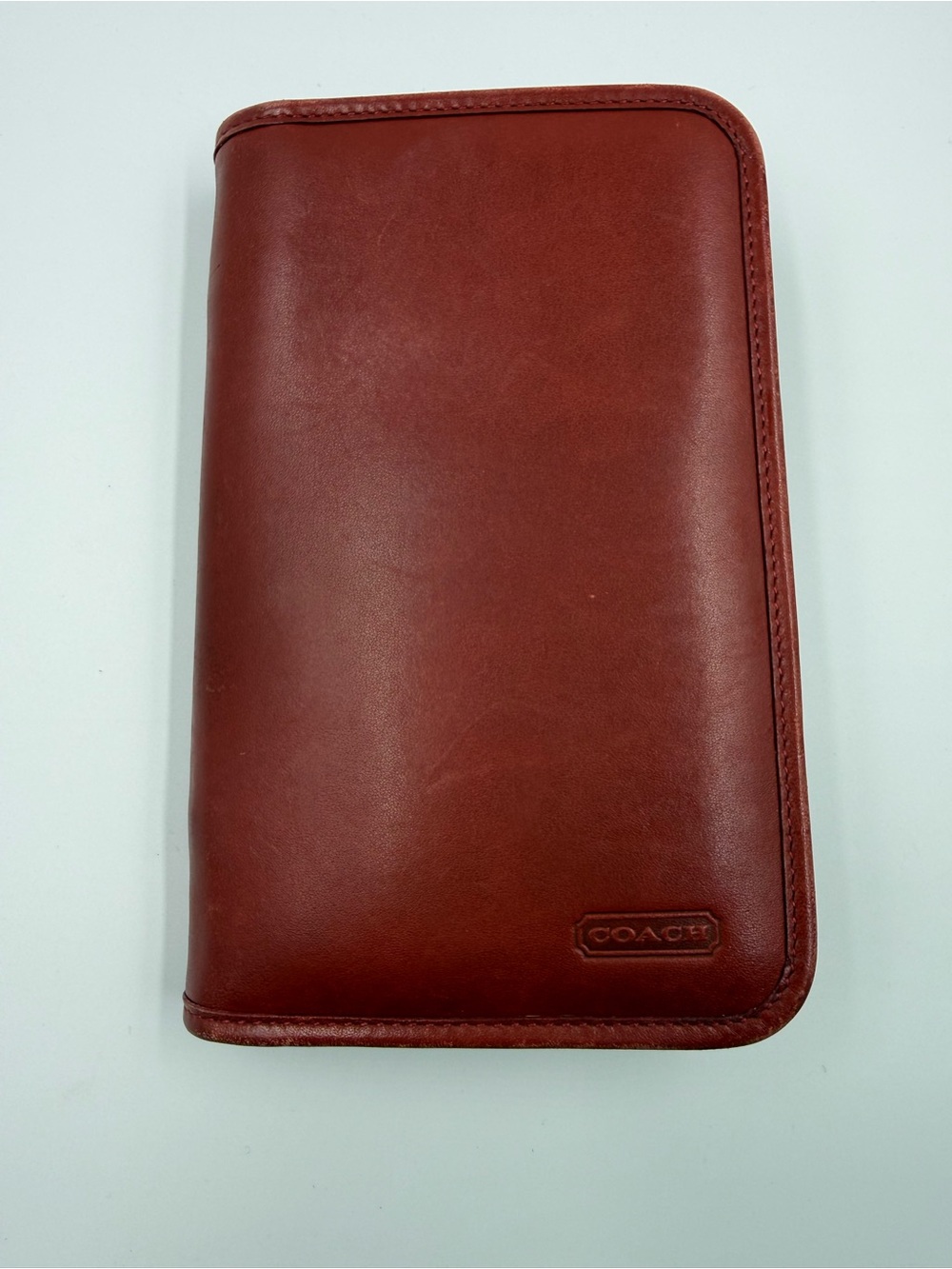 Coach Men’s Leather Travel Wallet in Chestnut Red